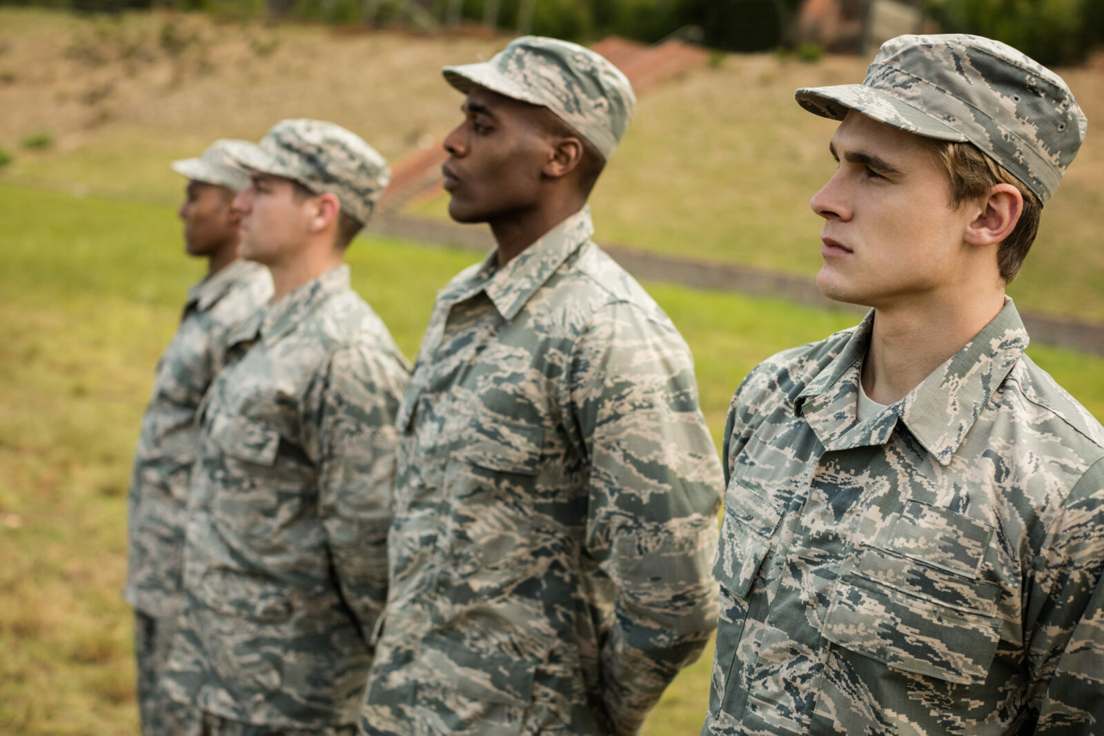 Group of military soldiers standing in line at boot camp